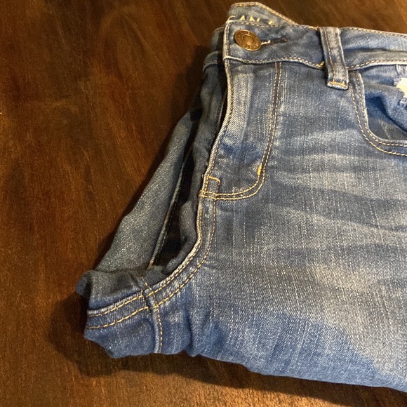 American Eagle Outfitters Denim - American Eagle medium wash size 10 next level stretch distressed skinny jeans